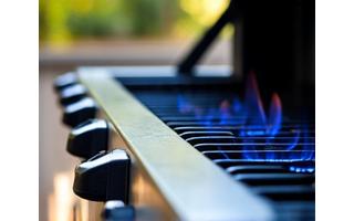 Before and after of a restored grill.