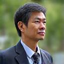 Portrait of David Chen, a proud owner of a Maple Hearth sustainable grill.
